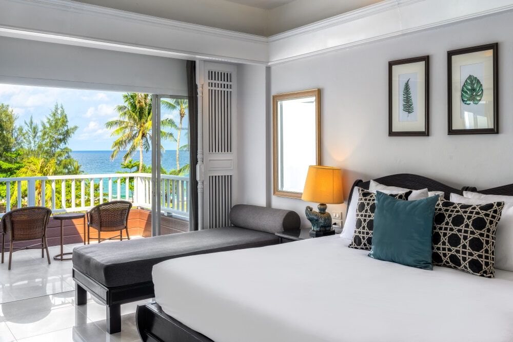 Seaview room with a private balcony at Thavorn Palm Beach, a MICE hotel in Phuket