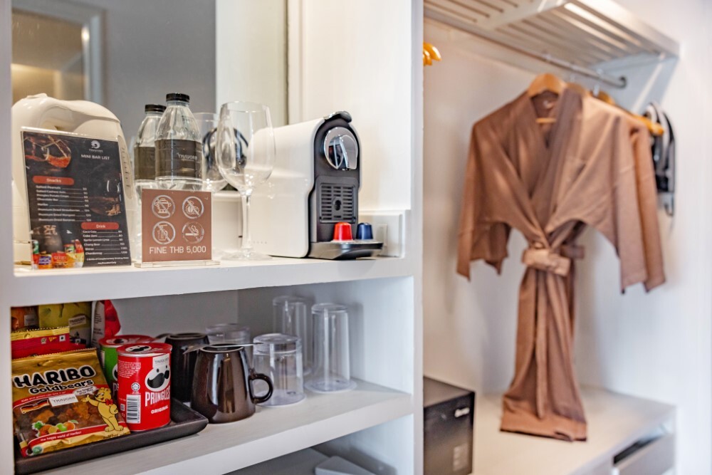 Premium toiletries displayed in a guest bathroom at Thavorn Palm Beach, a MICE hotel in Phuket