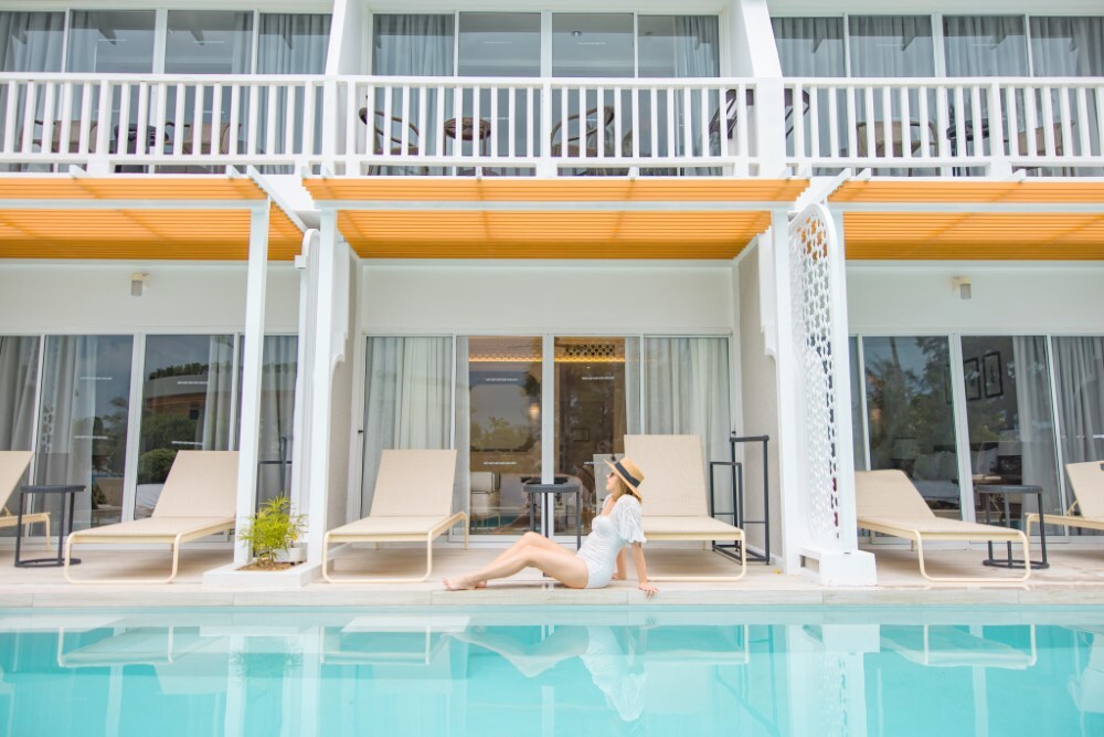 Private terrace with direct pool access at Thavorn Palm Beach, a MICE hotel in Phuket