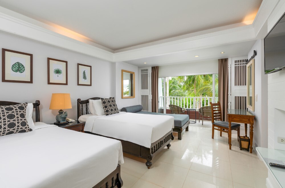 Deluxe room with twin beds at Thavorn Palm Beach, a MICE hotel in Phuket